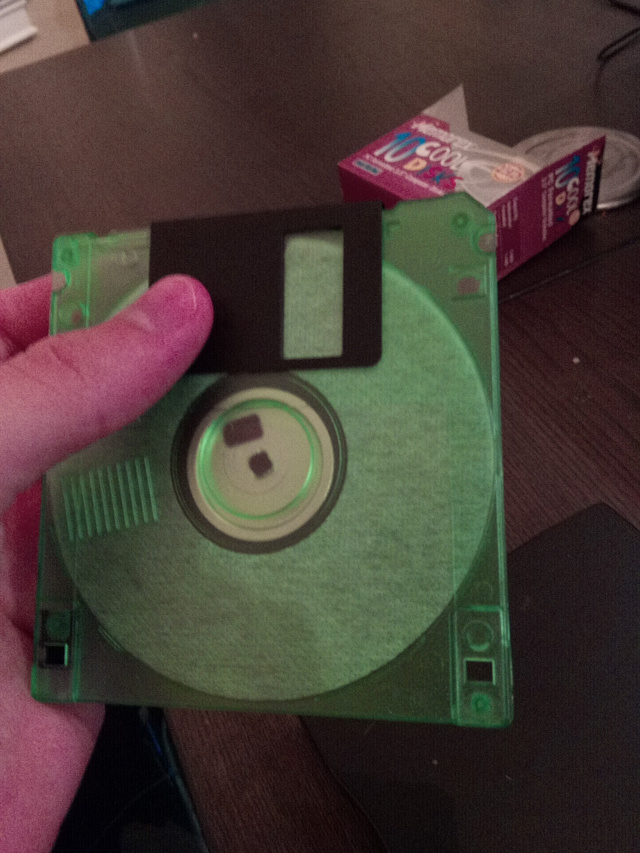 A green floppy disk